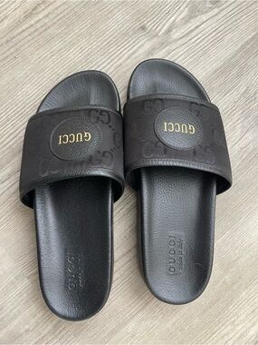 Gucci Black Slide Sandals with Gold Logo